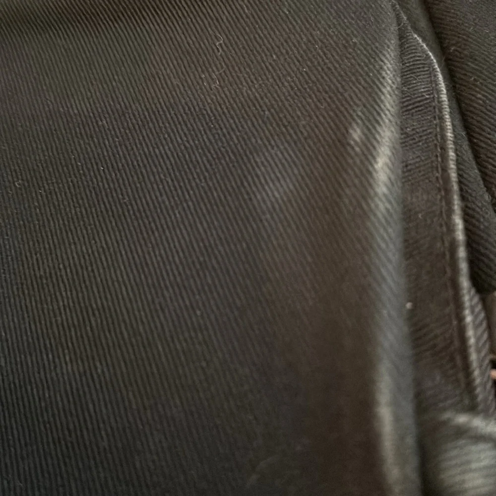 Everlane Modern Snap black cinch closure padded interior cotton blend backpack